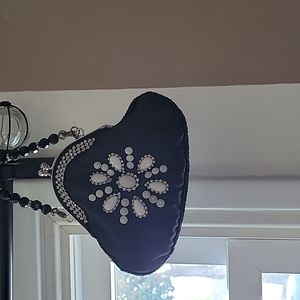 Small black clutch with beautiful stones with a beaded strap. Fully lined